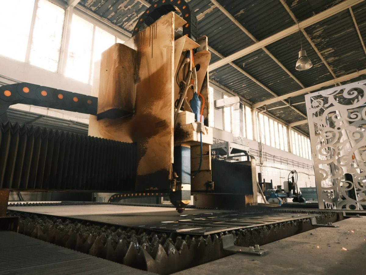 Interior of an engineering workshop with metalworking machinery and fabrication equipment